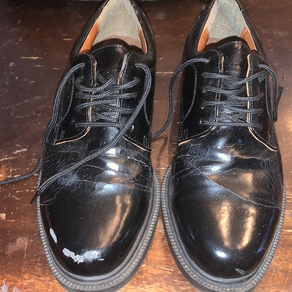 Mens gently used black wing tip dress shoes. Barely worn